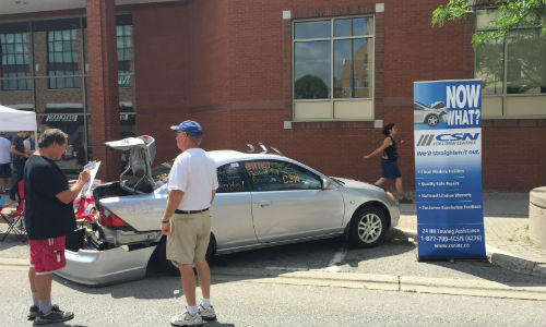 CSN-Brant County's booth at Brantford's PowerFest Car Show featured a damaged vehicle, encouraging attendees to 'Guess The Estimate.'