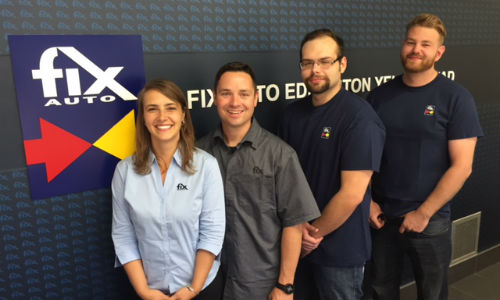 New strategic partners Patrick and Kristy Heard with some of their team at Fix Auto Edmonton Yellowhead.