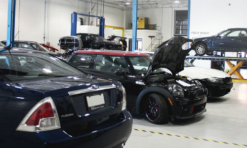 Part of the production area at Excellence Auto Collision. The facility has announced it will hold a career fair on November 18, 2015.