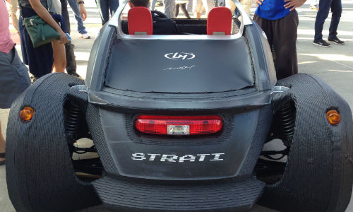 A rear view of the Strati, produced by Local Motors. About 75 percent of the vehicle is 3D printed.