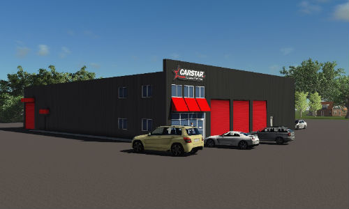 CARSTAR Woodstock will move into its new building, depicted above, this summer.