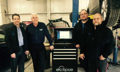 Training on the Eclipse system. From left: Roger Turmel of AutoQuip, Richard Marsh of CSN-Brimell, John Martinolich of Wedge Clamp Systems and Wayne James of AutoQuip.