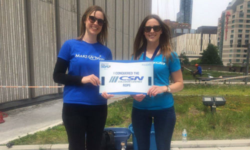 Meghan McGill of Make-A-Wish Canada and Jordie Bevan of CSN Corporate. Bevan rappelled down the side of Toronto's City Hall as part of the fundraising event.