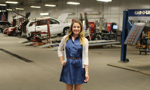 Shannon Kresge at her place of employment. Educated as a marketer, she found a passion for the business of collision repair.