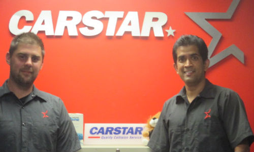 The new owners of CARSTAR Newmarket, Adrian Vagnaduzzo and Bisram Deokinandan.
