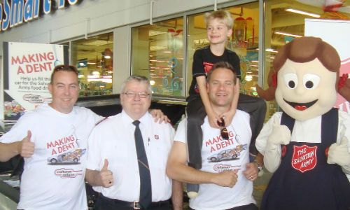 Team members from Craftsman Collision and the Salvation Army during last year's 'Make a Dent' campaign. Craftsman Collision has raised $217,276.42 in food and cash for the Salvation Army since 2009.