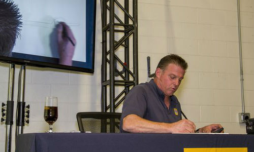 Chip Foose sketching at an event hosted by Carlson Body Shop Supply. Capital One Spark Business will host Foose for a special session during the SEMA Show where he will share his insights on small business.