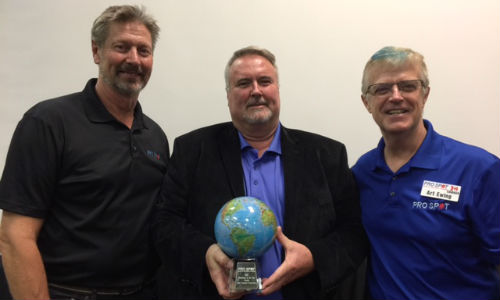 Russ Duncan (centre) accepts the Pro Spot Distributor of the Year Award at the 2016 SEMA Show from Ron Olsson (left) and Art Ewing of Pro Spot.