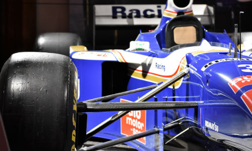 Villeneuve’s 1997 Williams FW19 on display at the AutoShow. The car still bears the tire mark from where another driver tried to run him off the track.