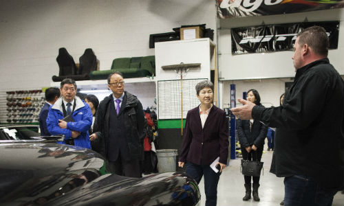 Rick Francoeur of CARSTAR Abbotsford and 360 Fabrication (right), giving a tour of the operations he co-owns with his brother Daryl to Chinese officials, including H.E. Consul General Liu Fei, the highest-ranking Chinese diplomat in Canada.