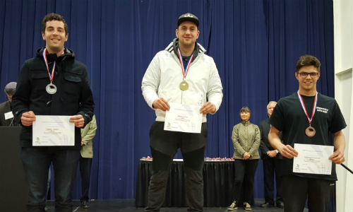 Okanagan College students on the podium at the BC Skills Competiton. From left: Caleb Loewen (silver), Andreas Roth (gold) and Marcel Kaemmerzell (bronze).