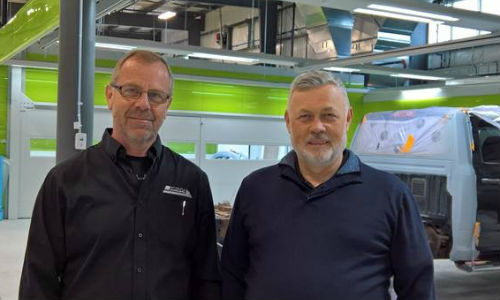 Albert Hutten, owner/operator of CSN-Blue Mountain Collision, and Osvaldo Bergaglio, President of Symach. CSN-Blue Mountain Collision has recently opened a new shop fitted with Symach's FixLine system.