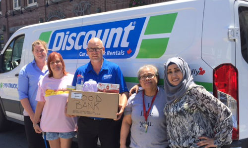 Parkdale Community Foodbank is helping out some of Tropicana's autobody students with regular food deliveries. Jack Martino, centre, is the co-owner of CSN-Martino Brothers Collision and Executive Director of the food bank.