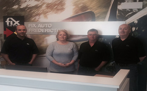 (From left to right) Nick Perry, Lynn Stewart, Dave Fairley, and Brian Fox at the Fix Auto Fredericton location.