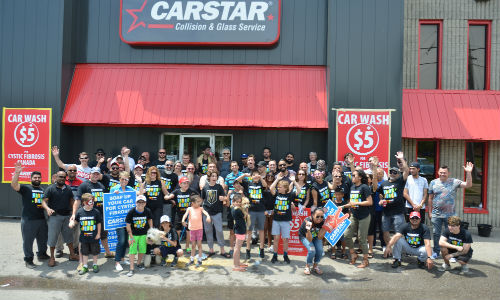 Volunteers at CARSTAR Brampton during CARSTAR's annual Soaps It Up carwash. CARSTAR and partners across the country come together every year to raise funds for Cystic Fibrosis Canada.