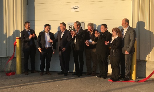 The Copart team during their ribbon cutting ceremony at the new Calgary facility.