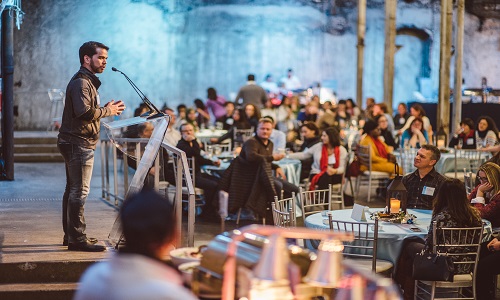 BASF Canada president, Marcelo Lu, speaks to employees at a holiday luncheon celebration in the Distillery District.