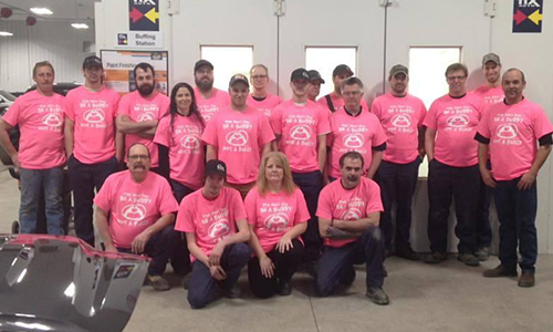 The Fix Auto Fredericton team sporting anti-bullying t-shirts.