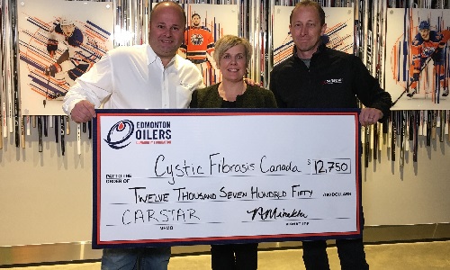 From left to right: Brandon Newell, Cystic Fibrosis Canada; Natalie Minkler, Edmonton Oilers Community Foundation; Mike Piper, CARSTAR.
