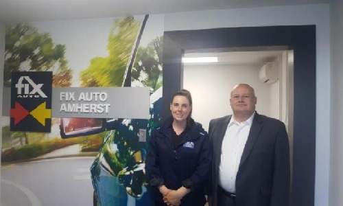 Fix Auto Amherst manager Laura White and Steve Smith, Taylor Ford Amherst general manager.